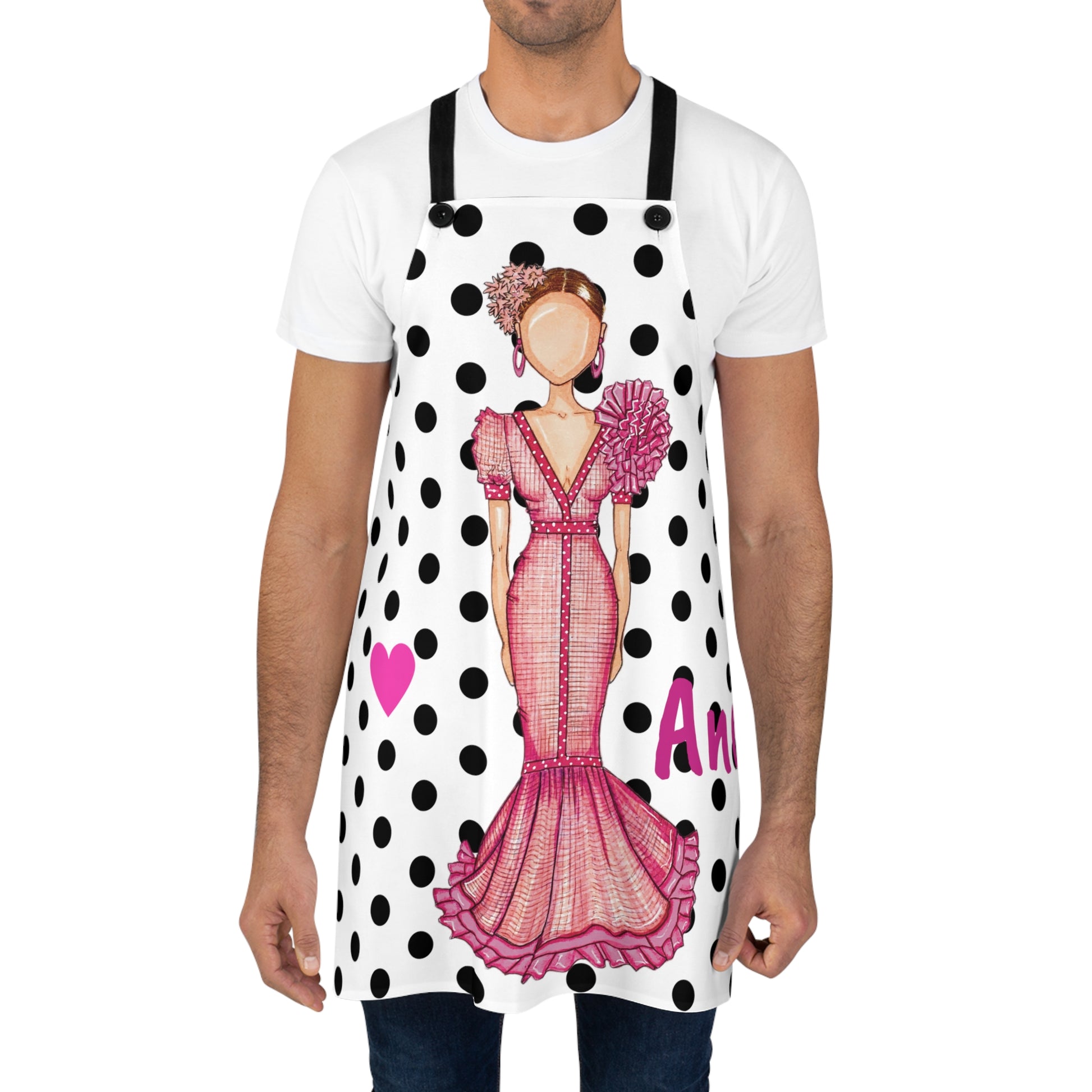 a man wearing an apron with a polka dot dress on it