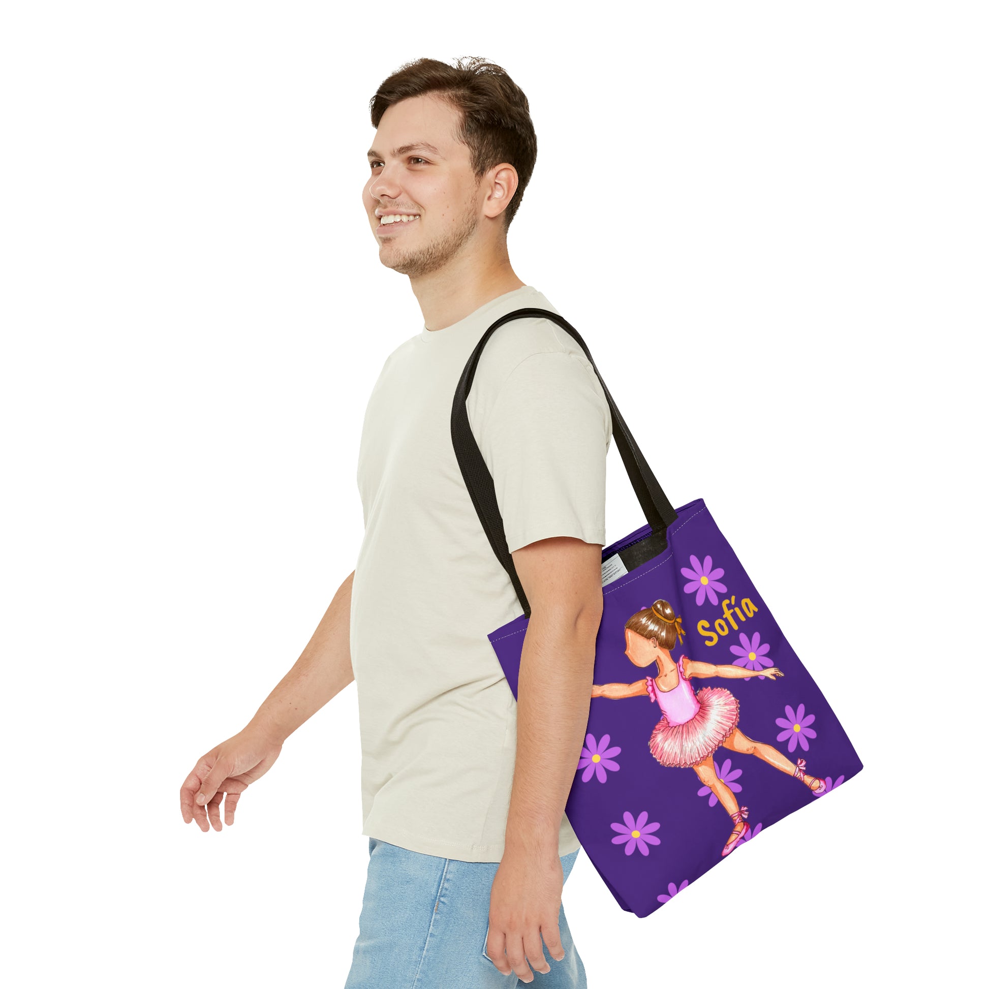 a man carrying a purple bag with a picture of a ballerina on it