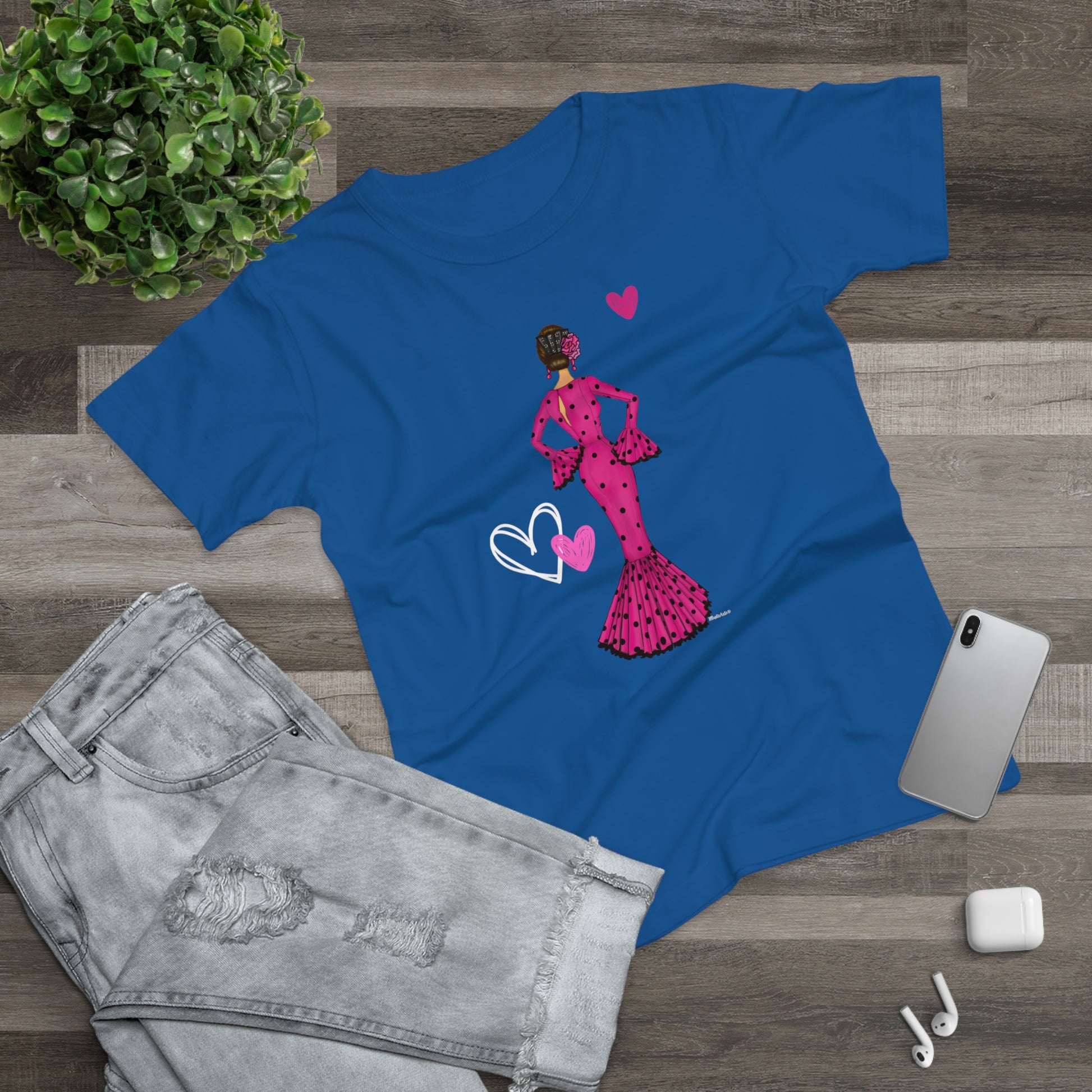 a t - shirt with a picture of a woman in a pink dress