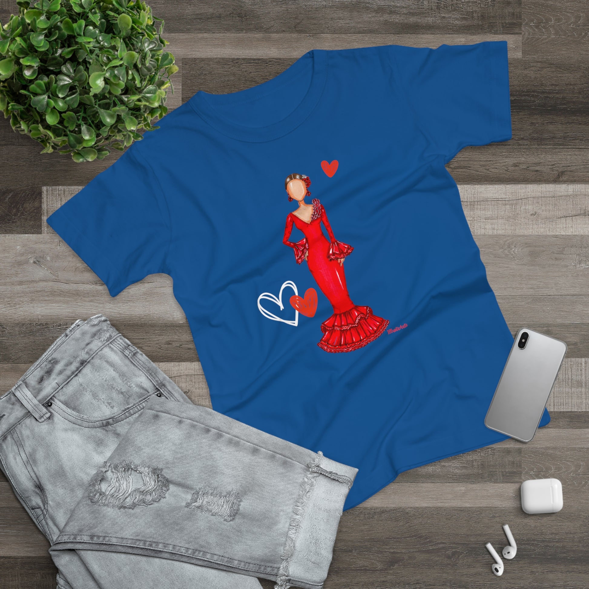 a blue t - shirt with a picture of a woman in a red dress