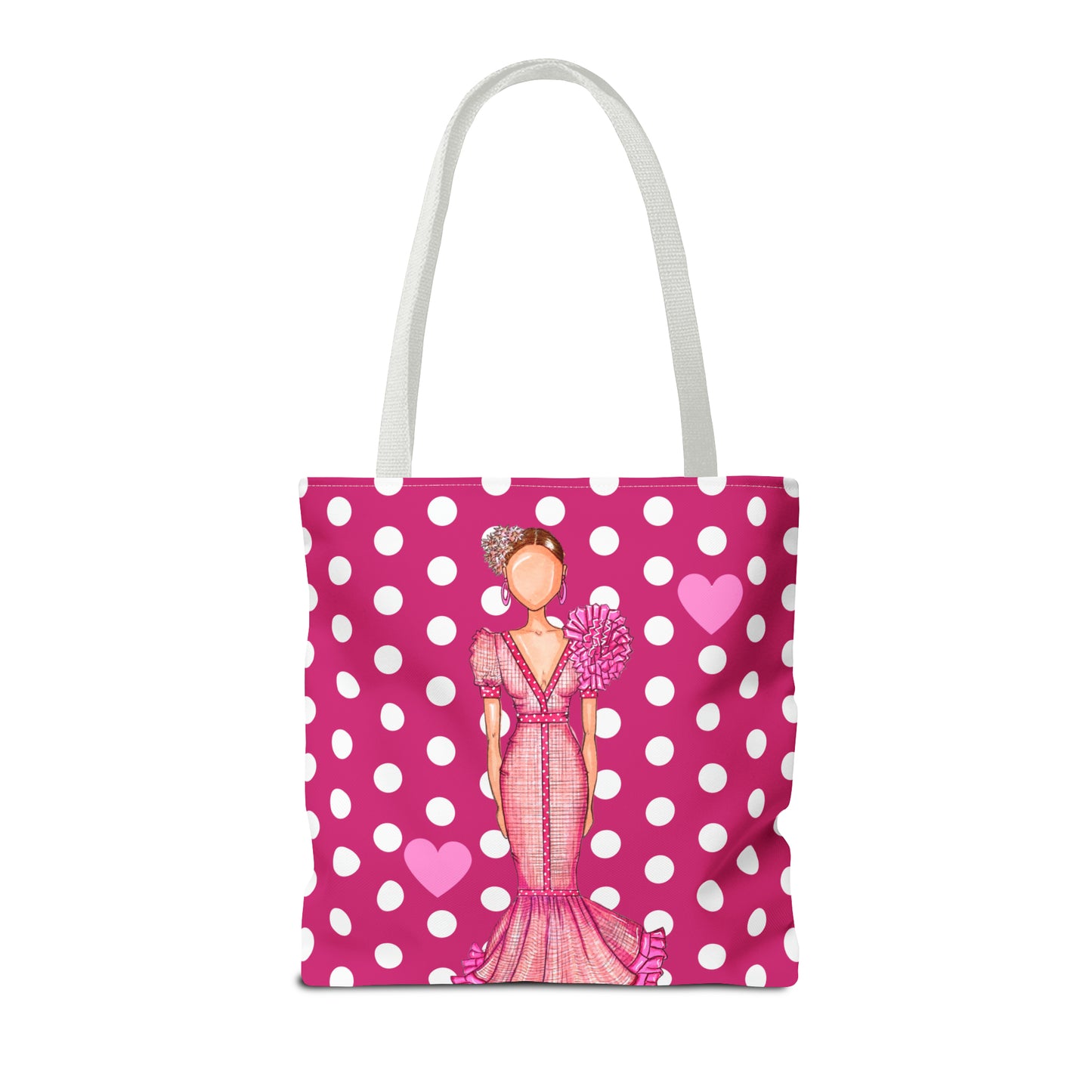 a pink and white polka dot tote bag with a woman in a pink dress