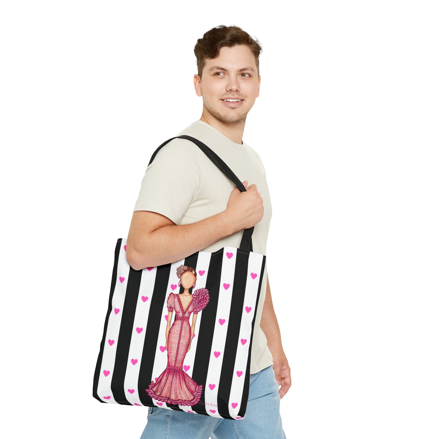 a man holding a large black and white striped bag