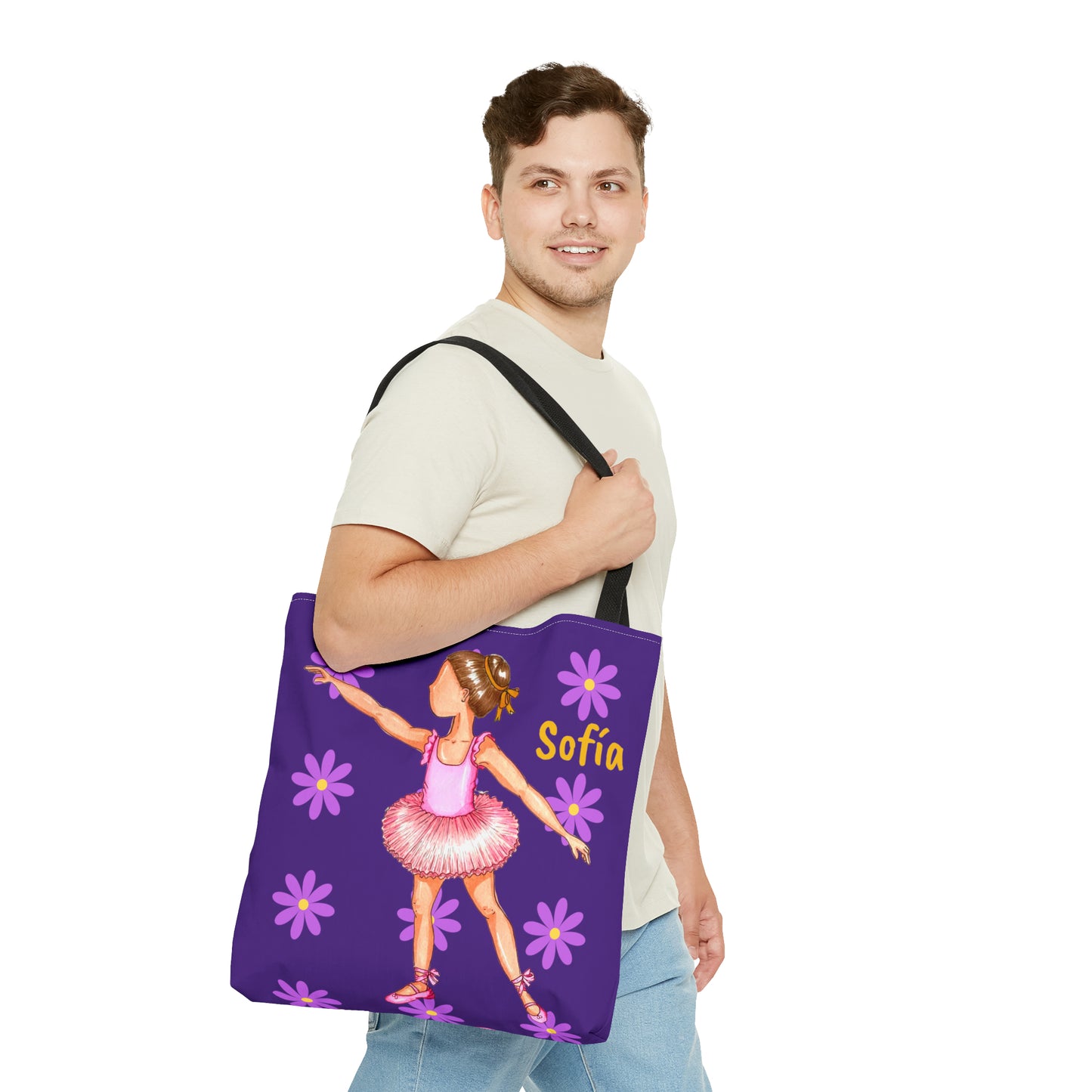 a man carrying a purple tote bag with a picture of a ballerina