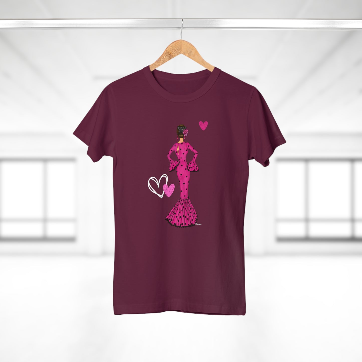 a t - shirt with a woman in a dress holding a heart