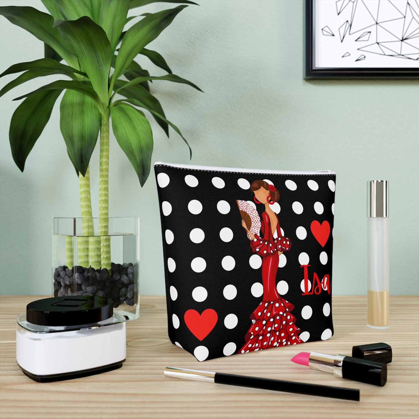a polka dot purse with a lady in a red dress