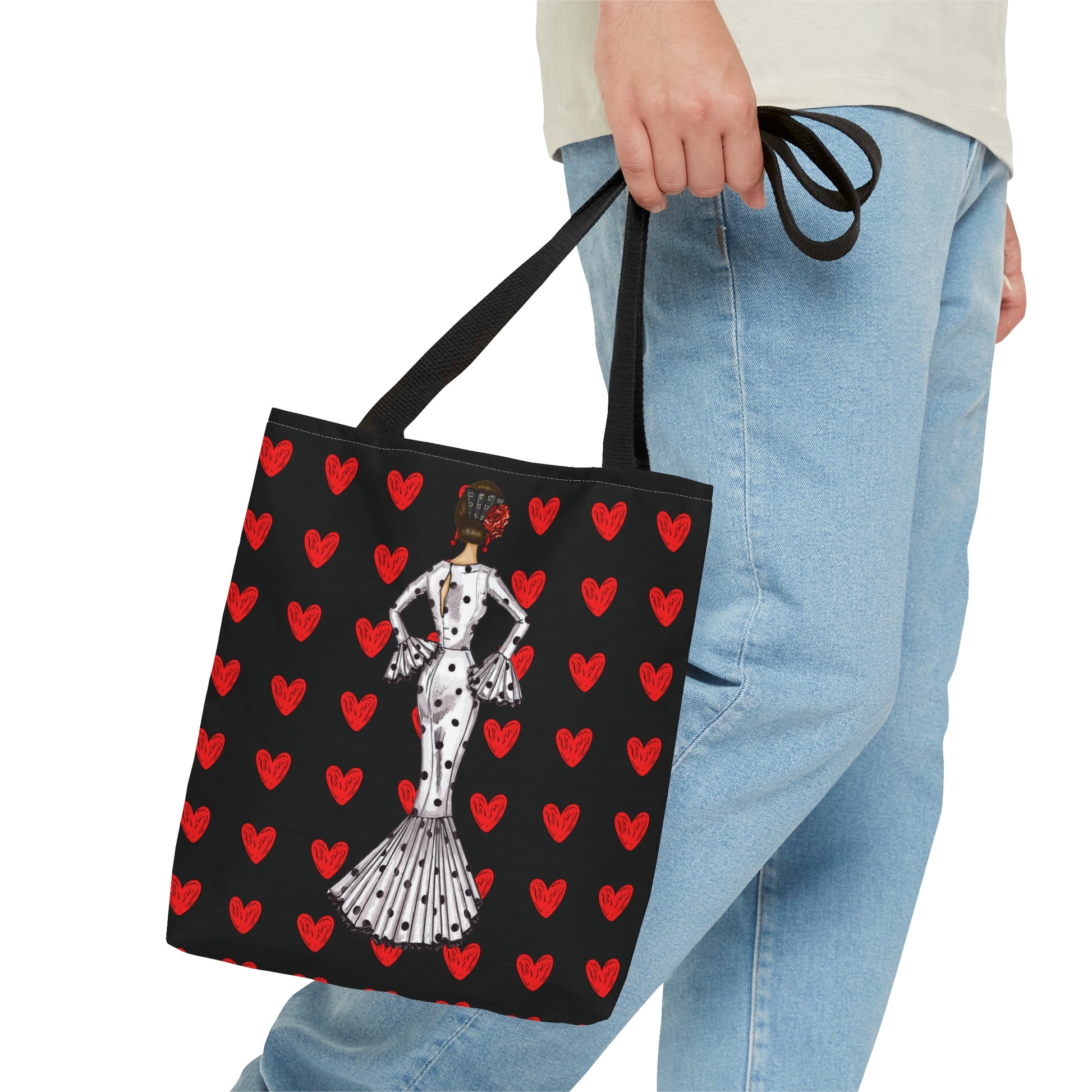 a woman carrying a black and red bag with a dalmatian dog on it