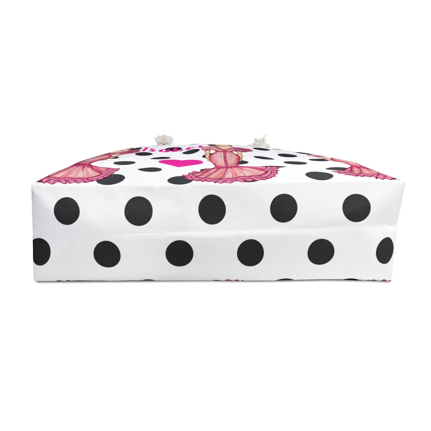 a polka dot box with a pink butterfly on it