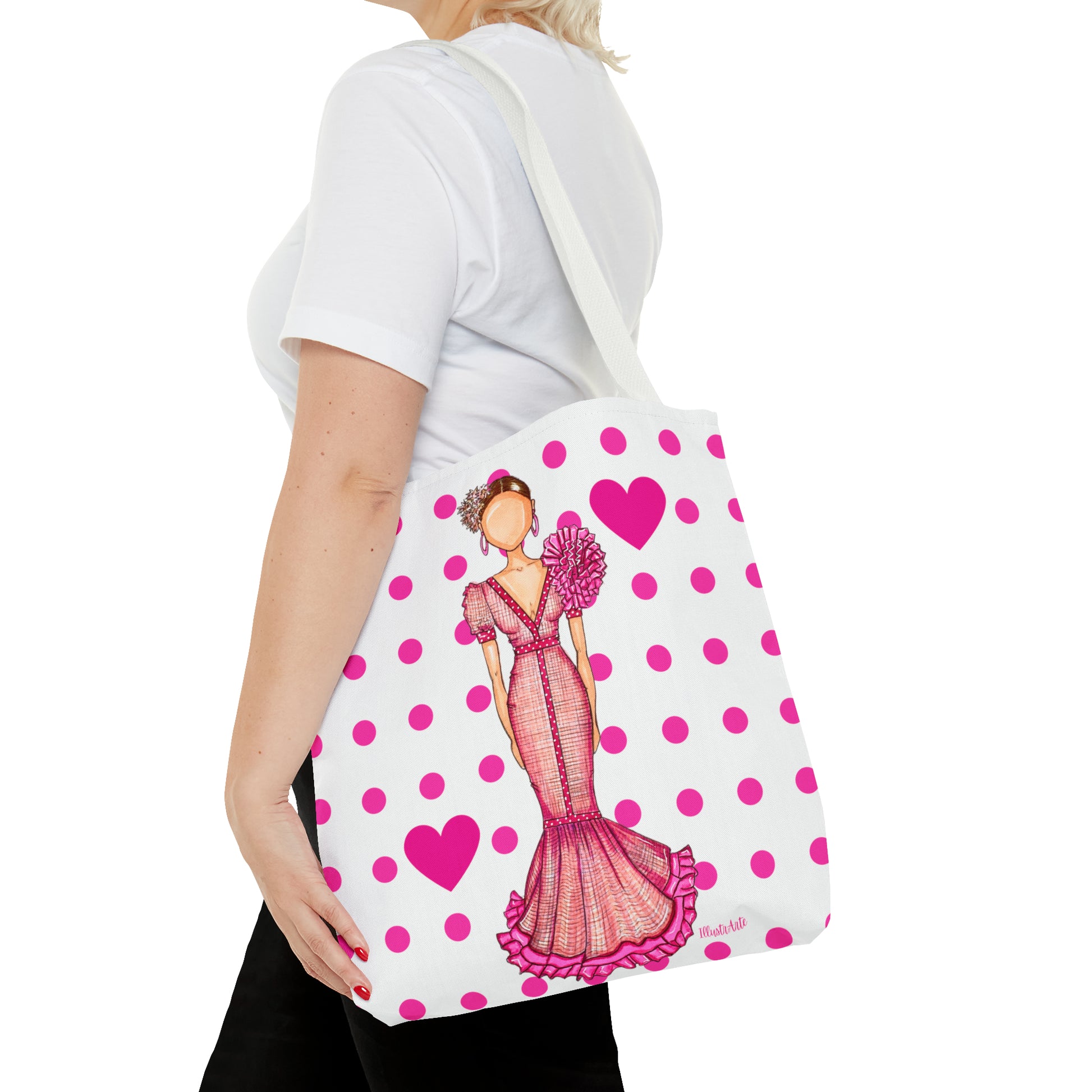 a woman carrying a pink polka dot purse