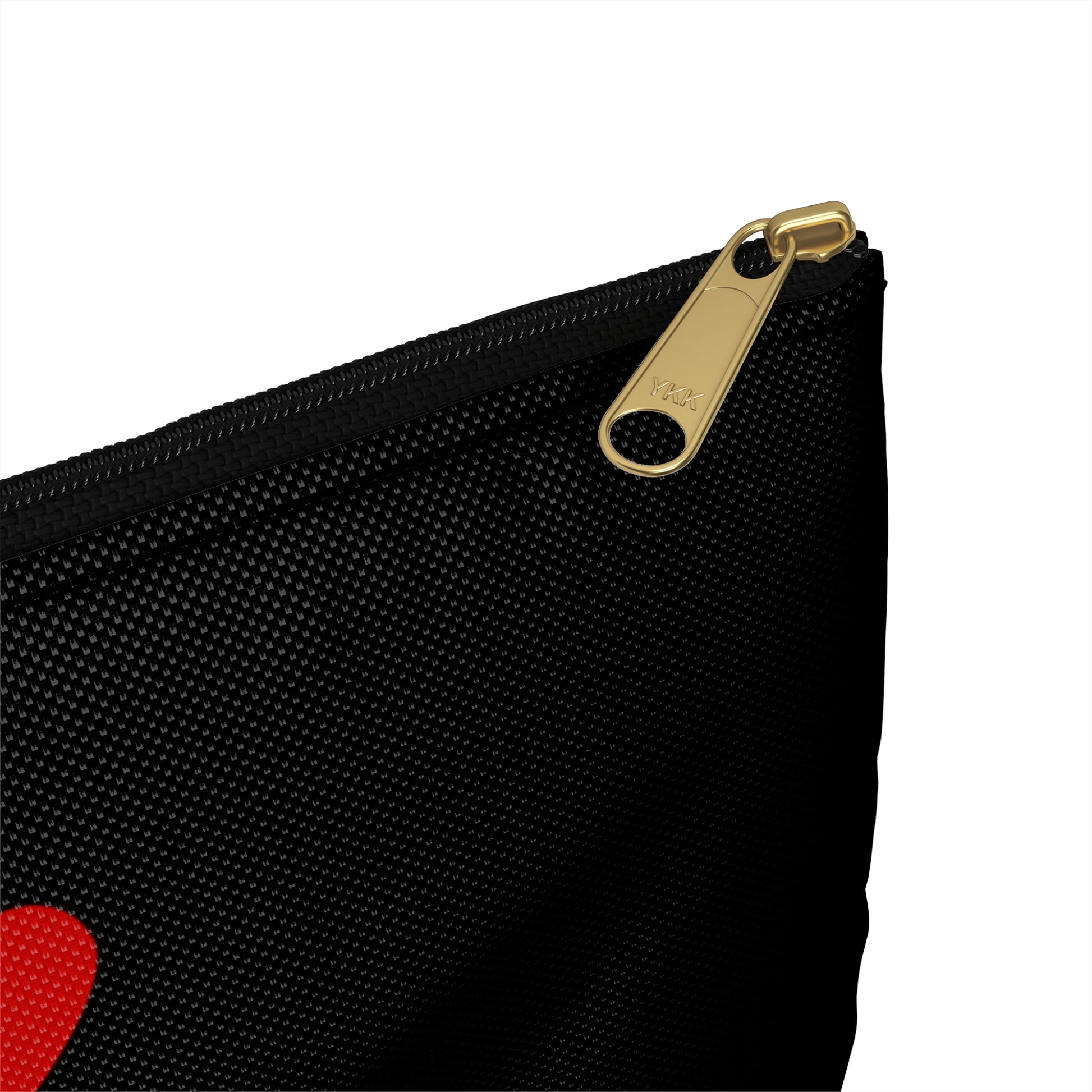 a black bag with a red heart on it