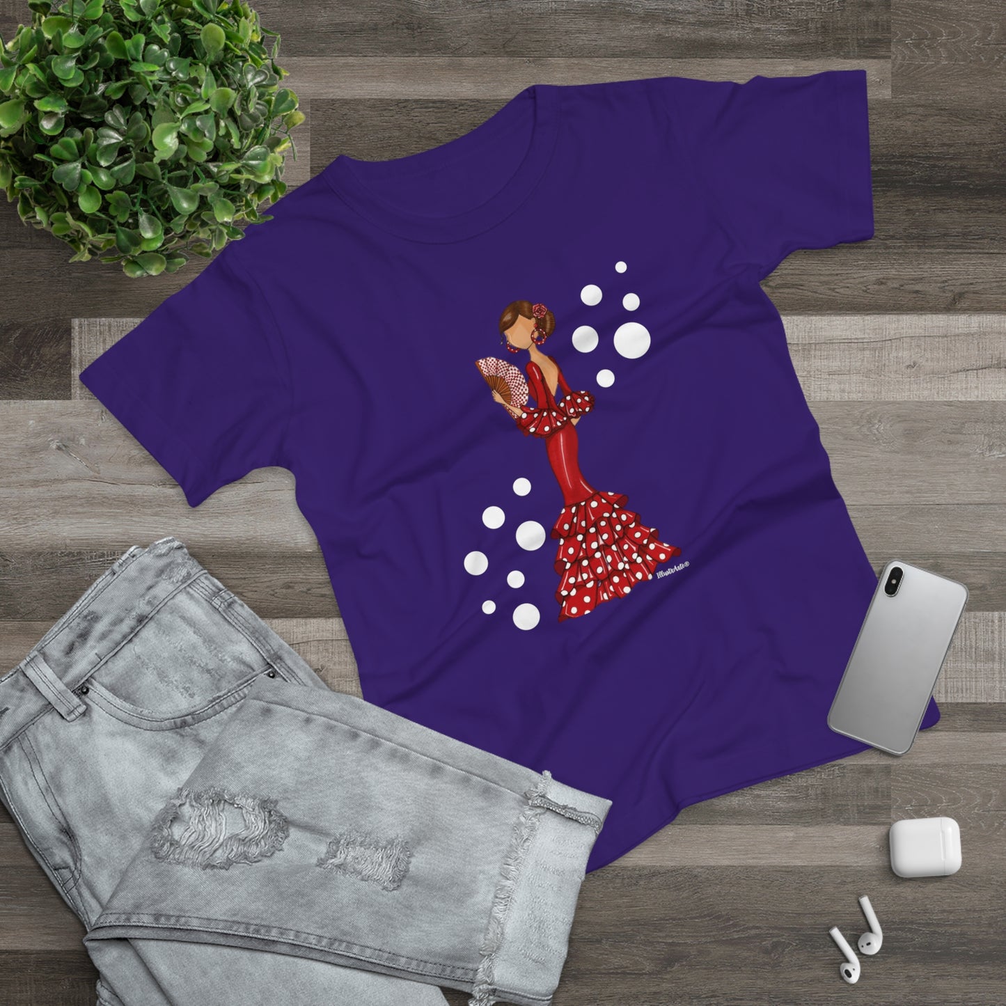 a purple t - shirt with a picture of a woman in a polka dot dress