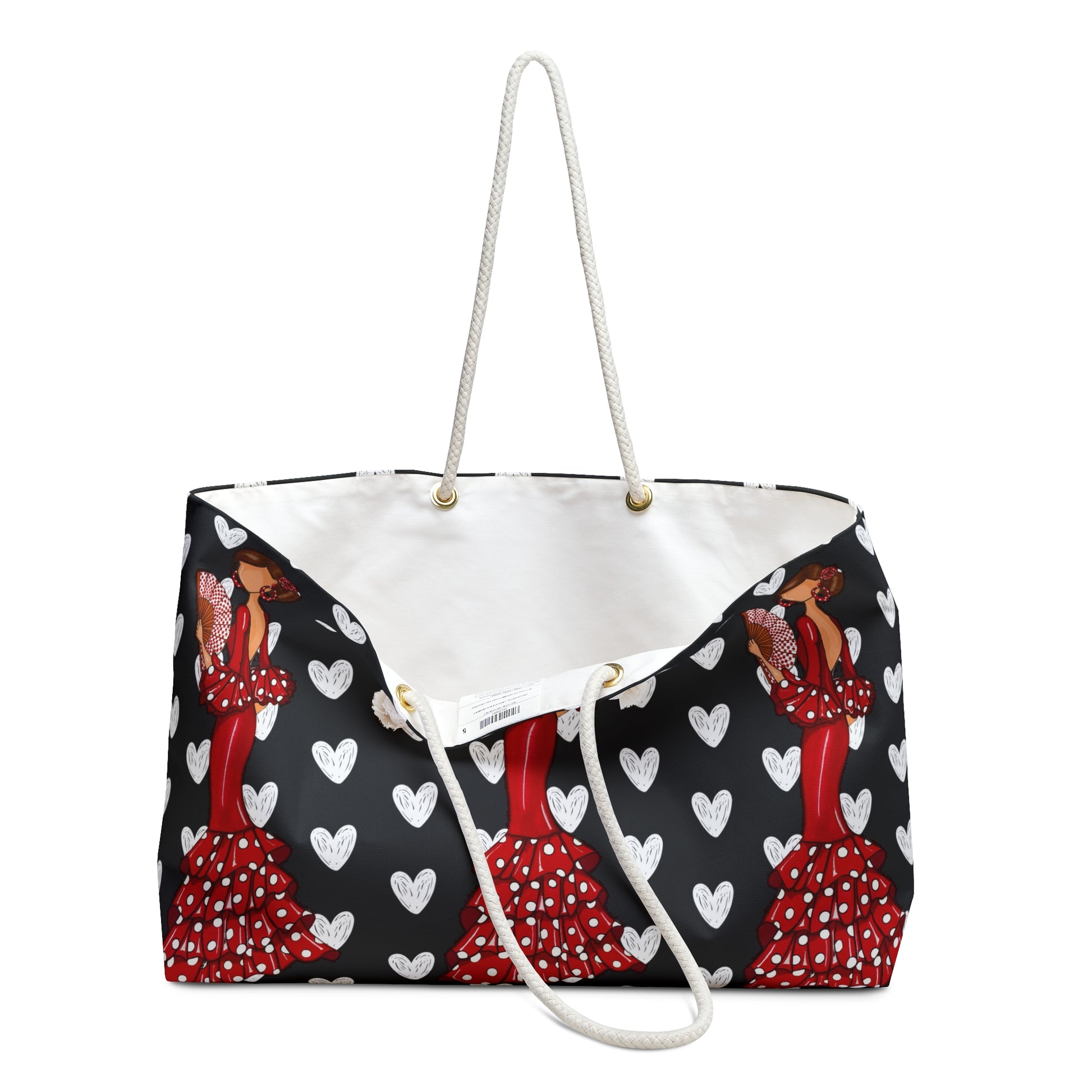 a black and white bag with hearts on it