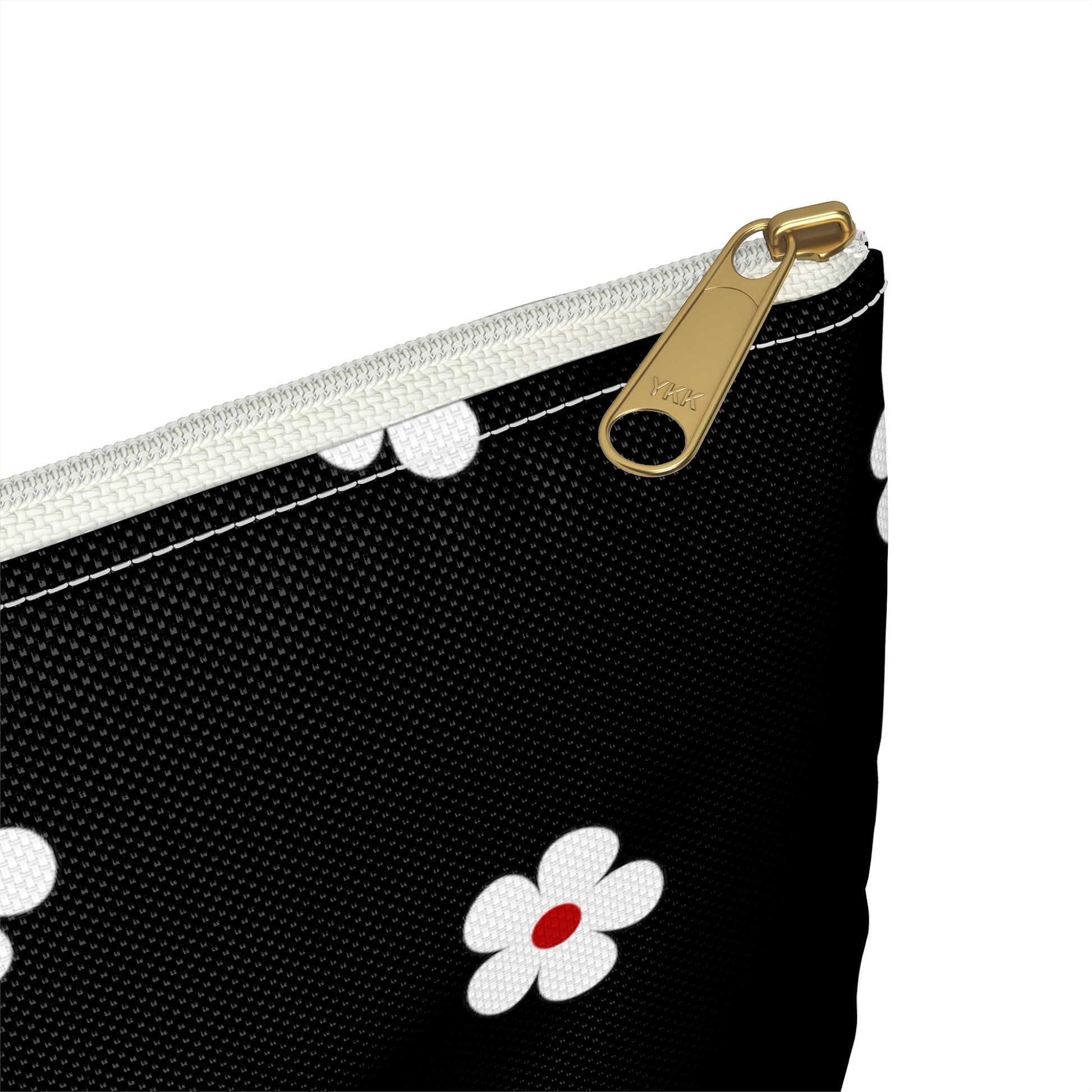 a black and white purse with a flower on it