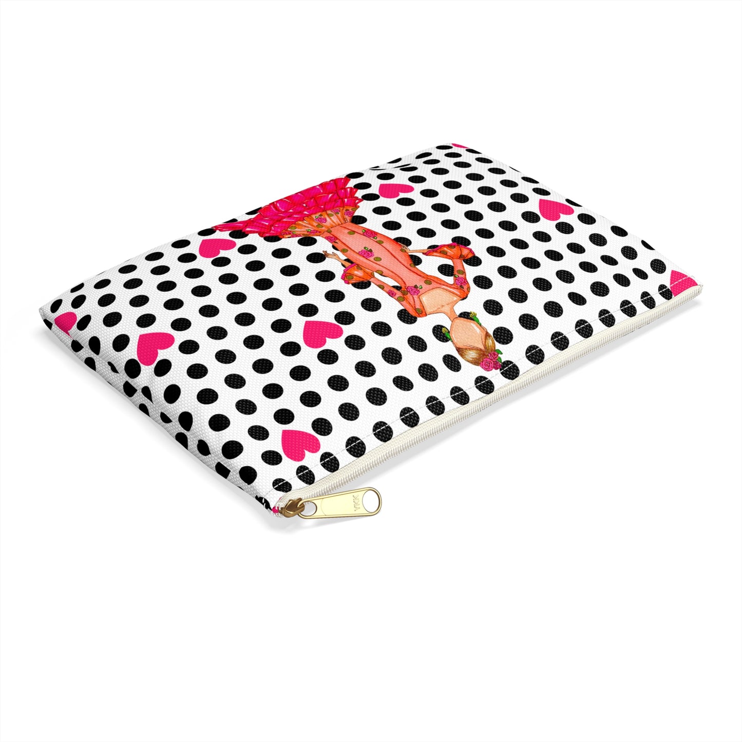 a black and white polka dot notebook with a pink bow