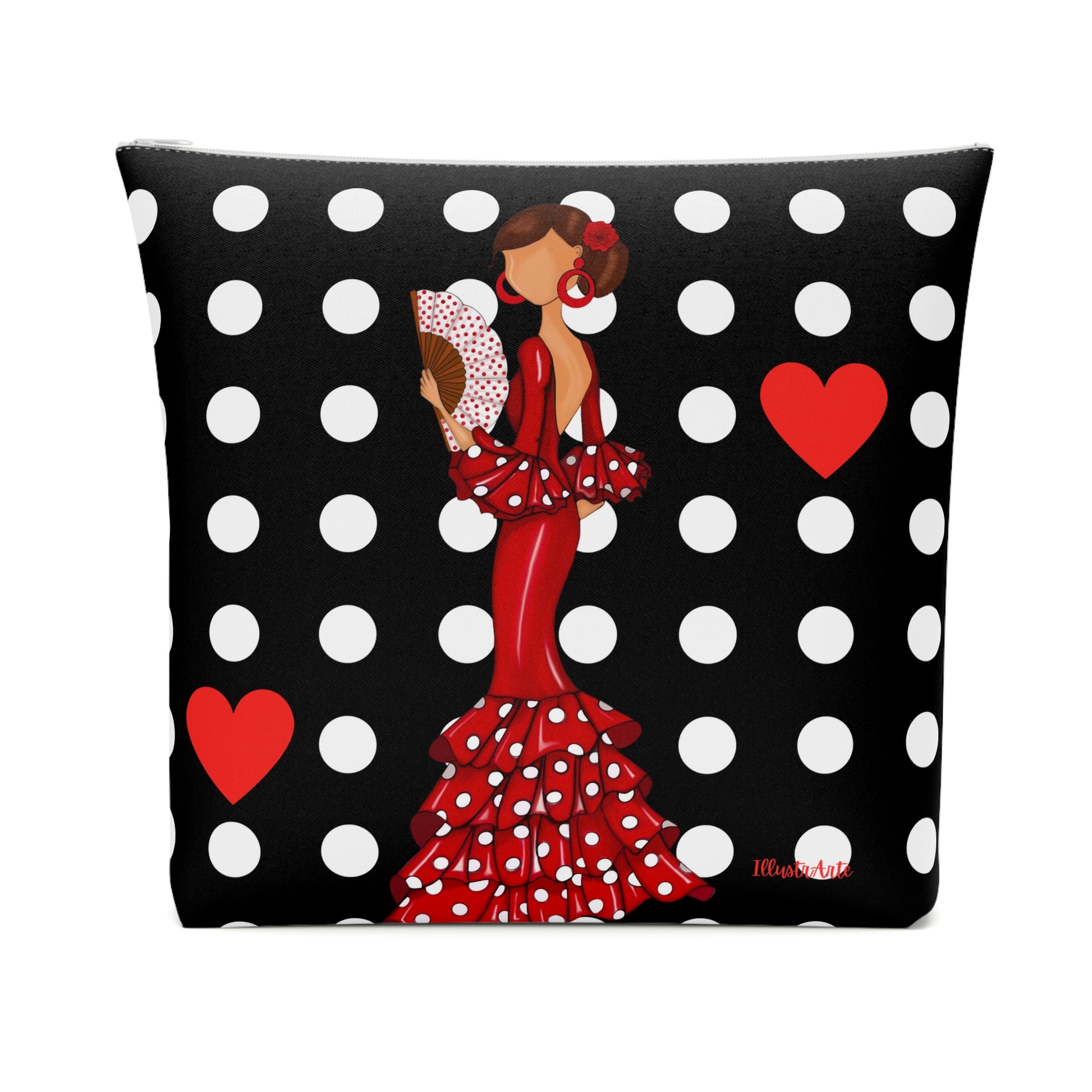 a black and white polka dot pillow with a woman in a red dress holding a