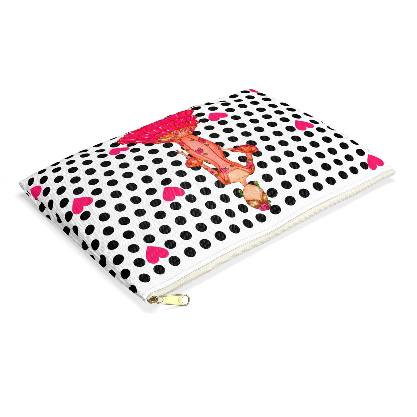 a black and white polka dot notebook with a cartoon character on it