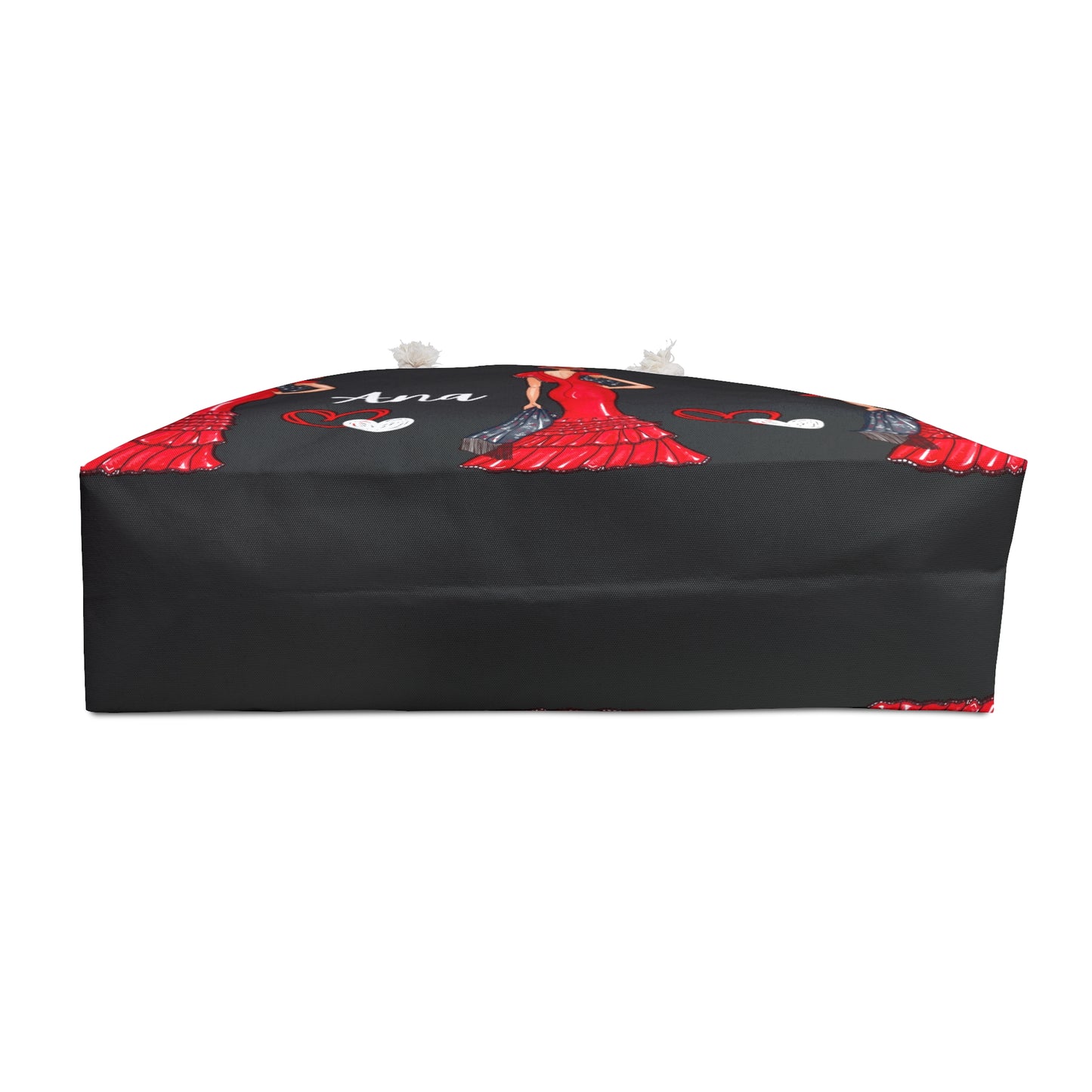 a black bag with a red and black design on it
