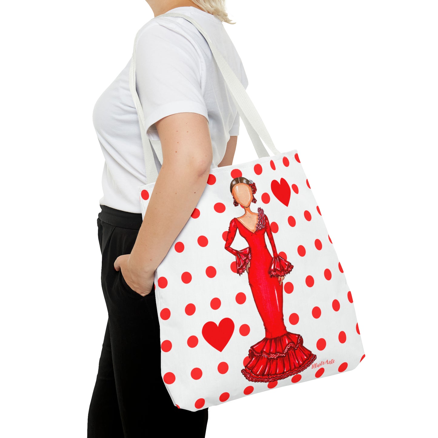 a woman carrying a red and white polka dot bag