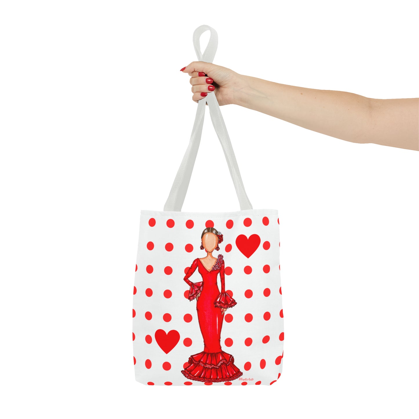a woman's hand holding a red and white bag with a picture of a