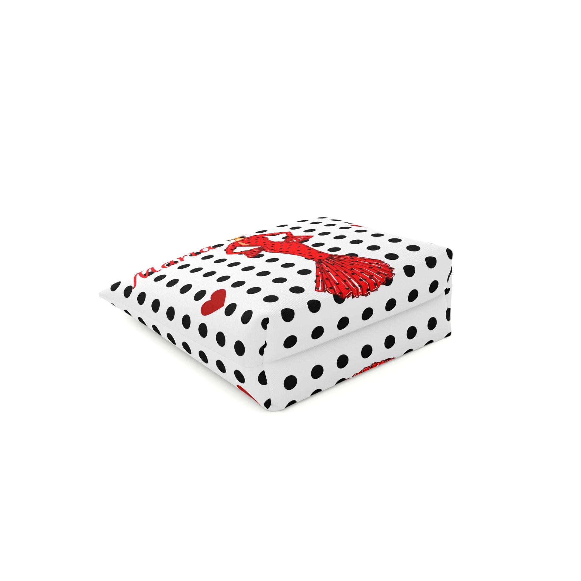 a polka dot box with a red bow on it