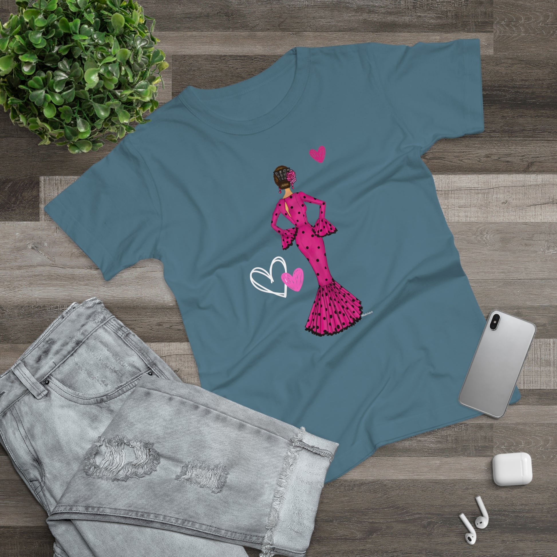 a t - shirt with an image of a woman in a pink dress