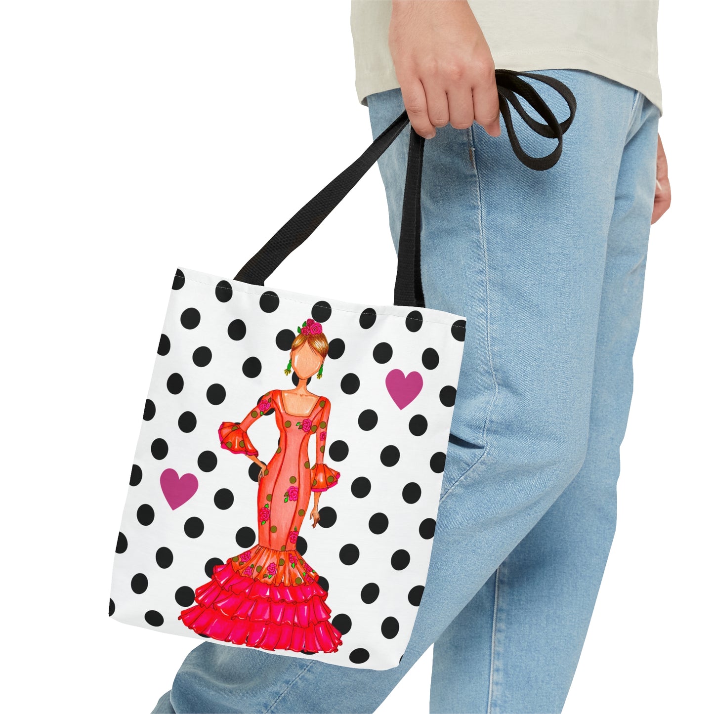 a woman carrying a shopping bag with a picture of a woman on it