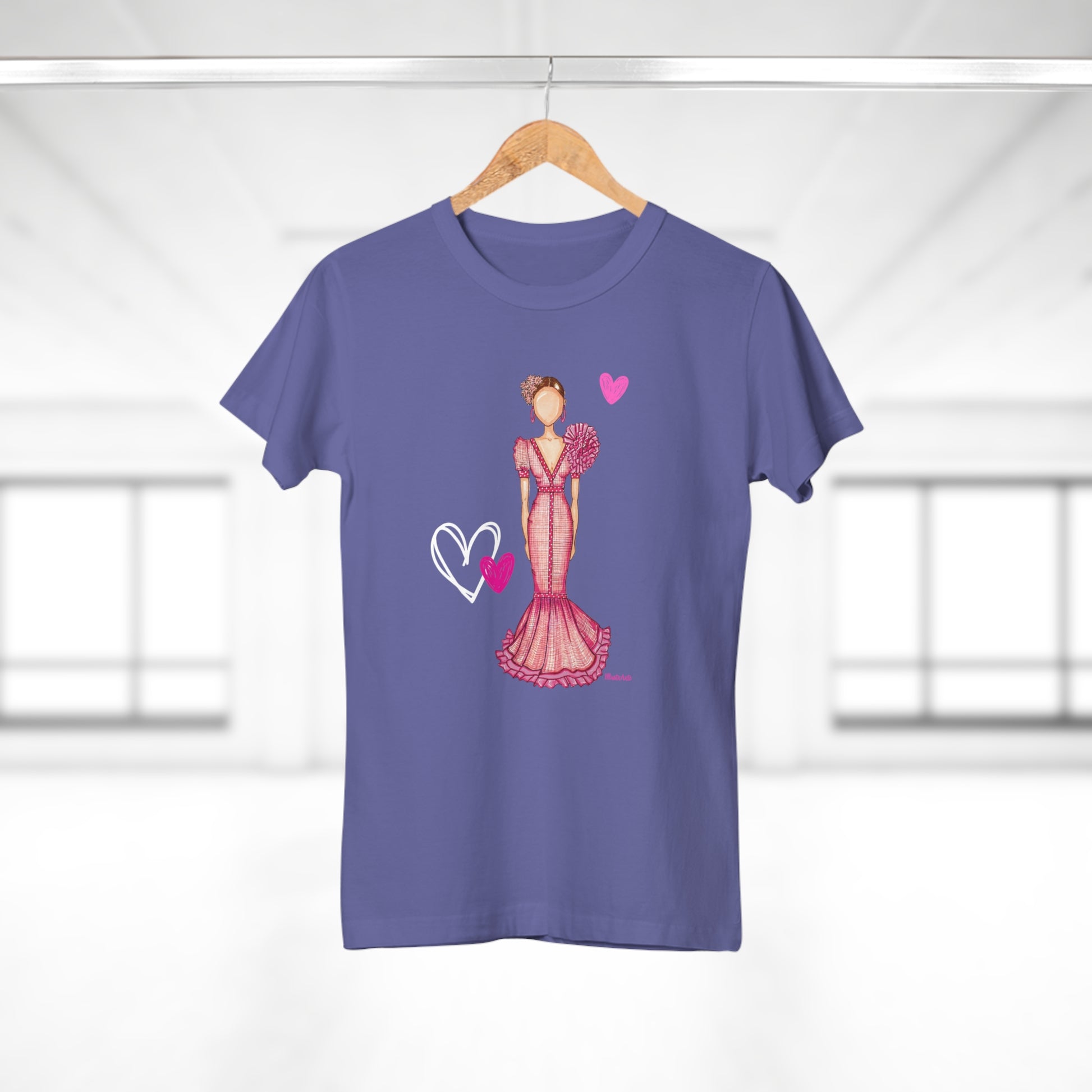 a t - shirt with a woman in a dress on a hanger
