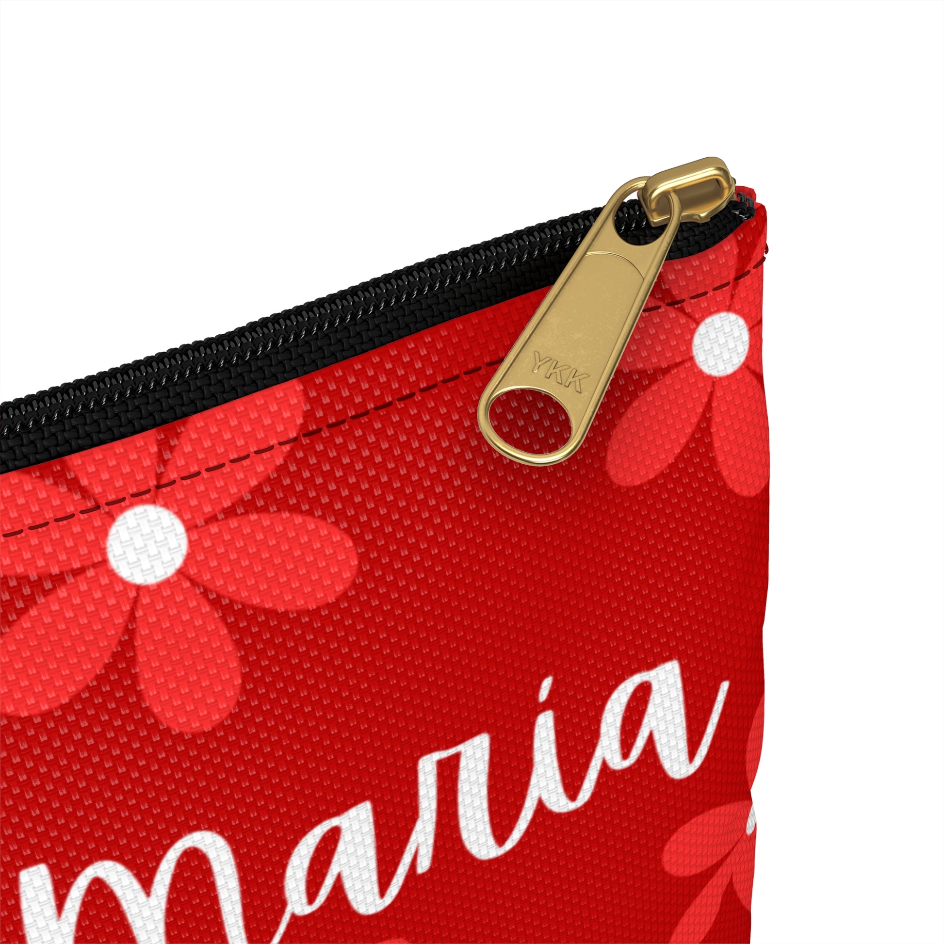 a close up of a zippered pouch with a name on it