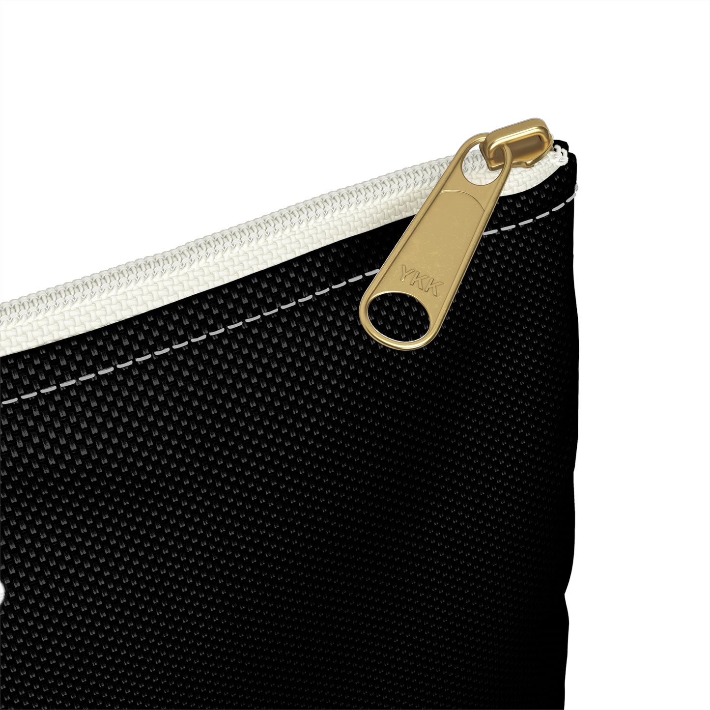 a close up of a zippered pouch with a gold handle