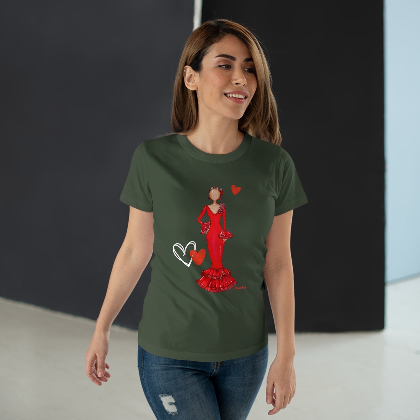 a woman wearing a green t - shirt with a red dress