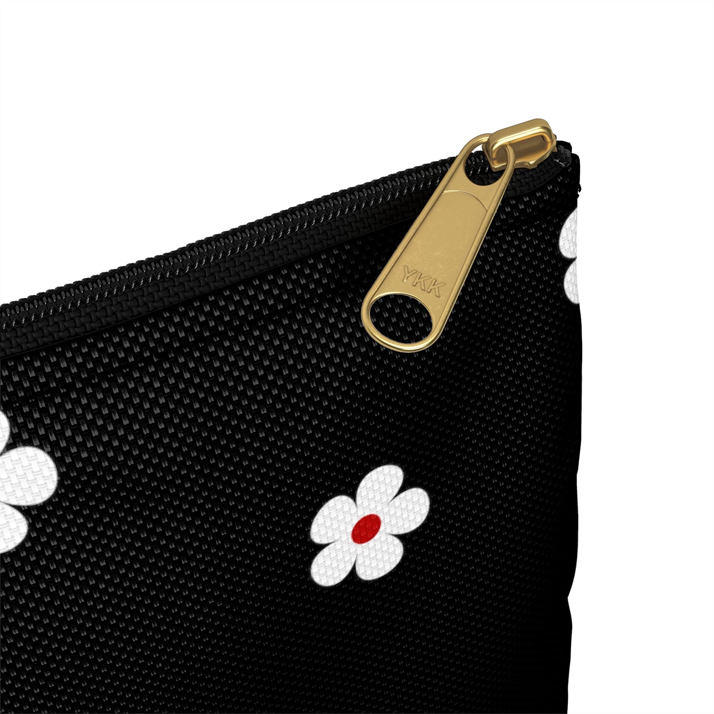a black purse with white flowers on it