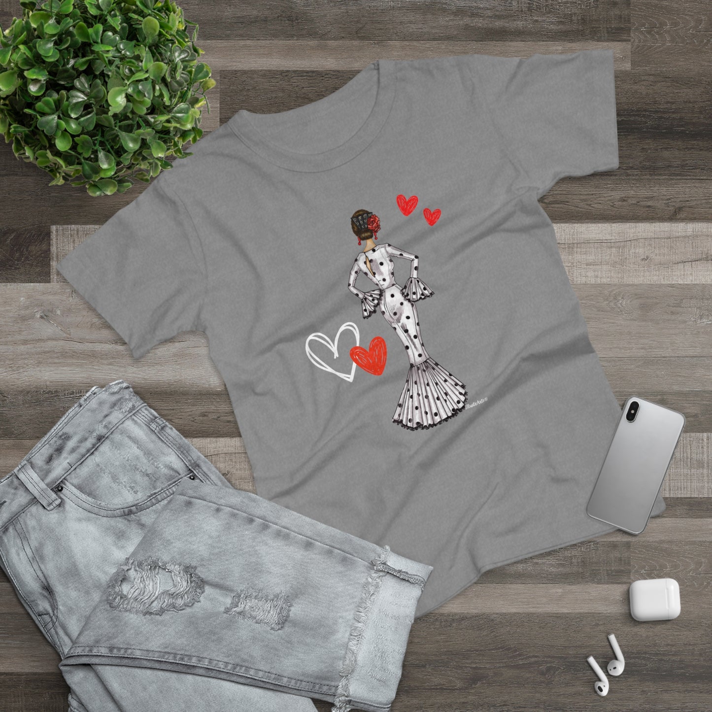 a t - shirt with a picture of a woman holding a heart