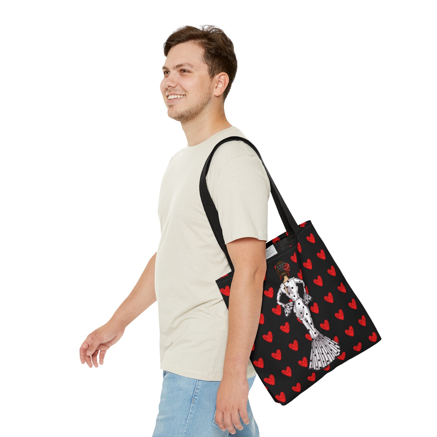 a man carrying a black and red tote bag