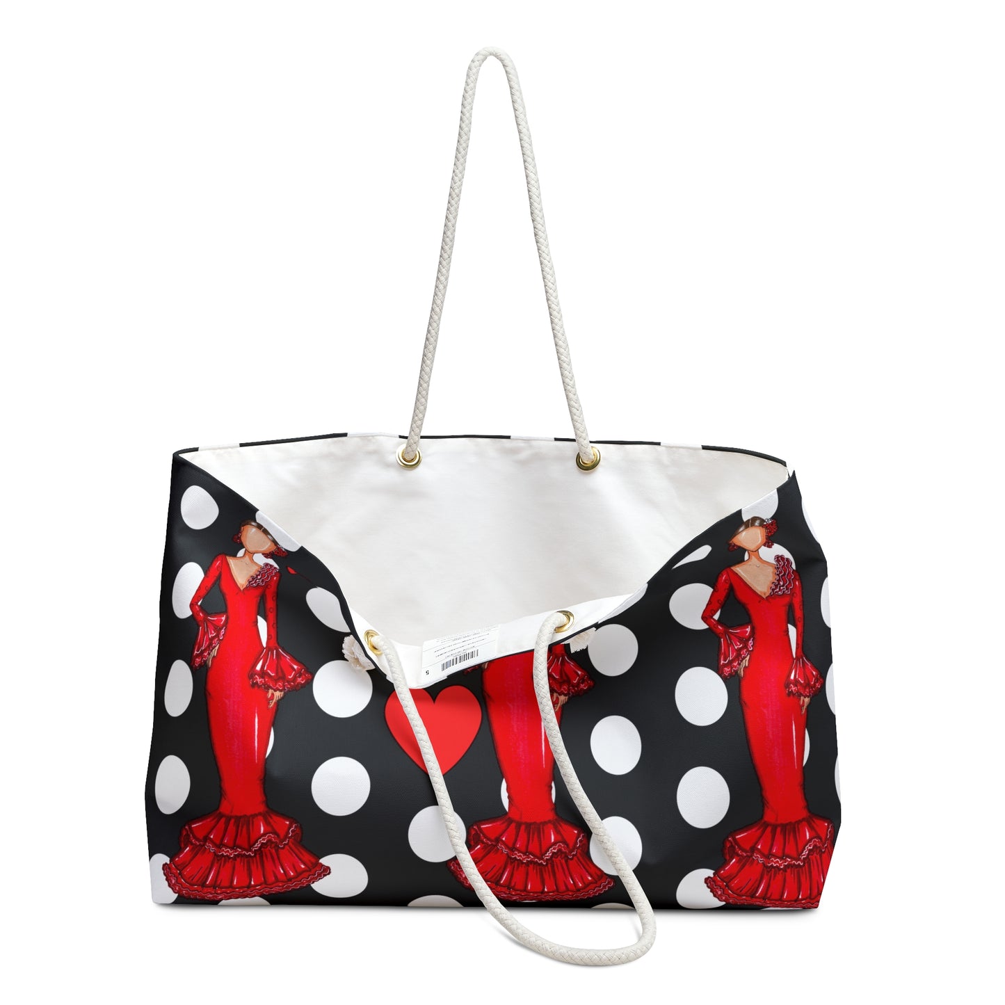 a black and white polka dot purse with a red woman on it