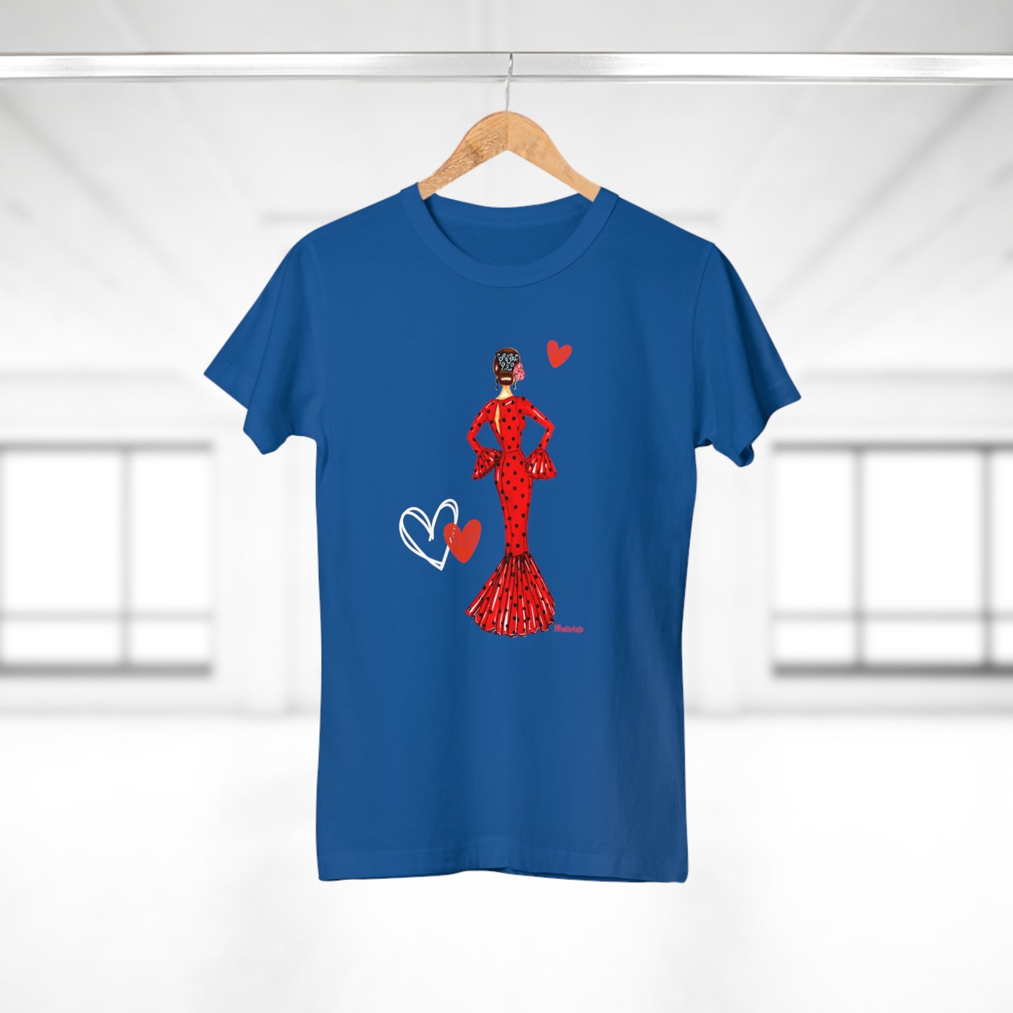 a blue t - shirt with a woman in a red dress holding a heart
