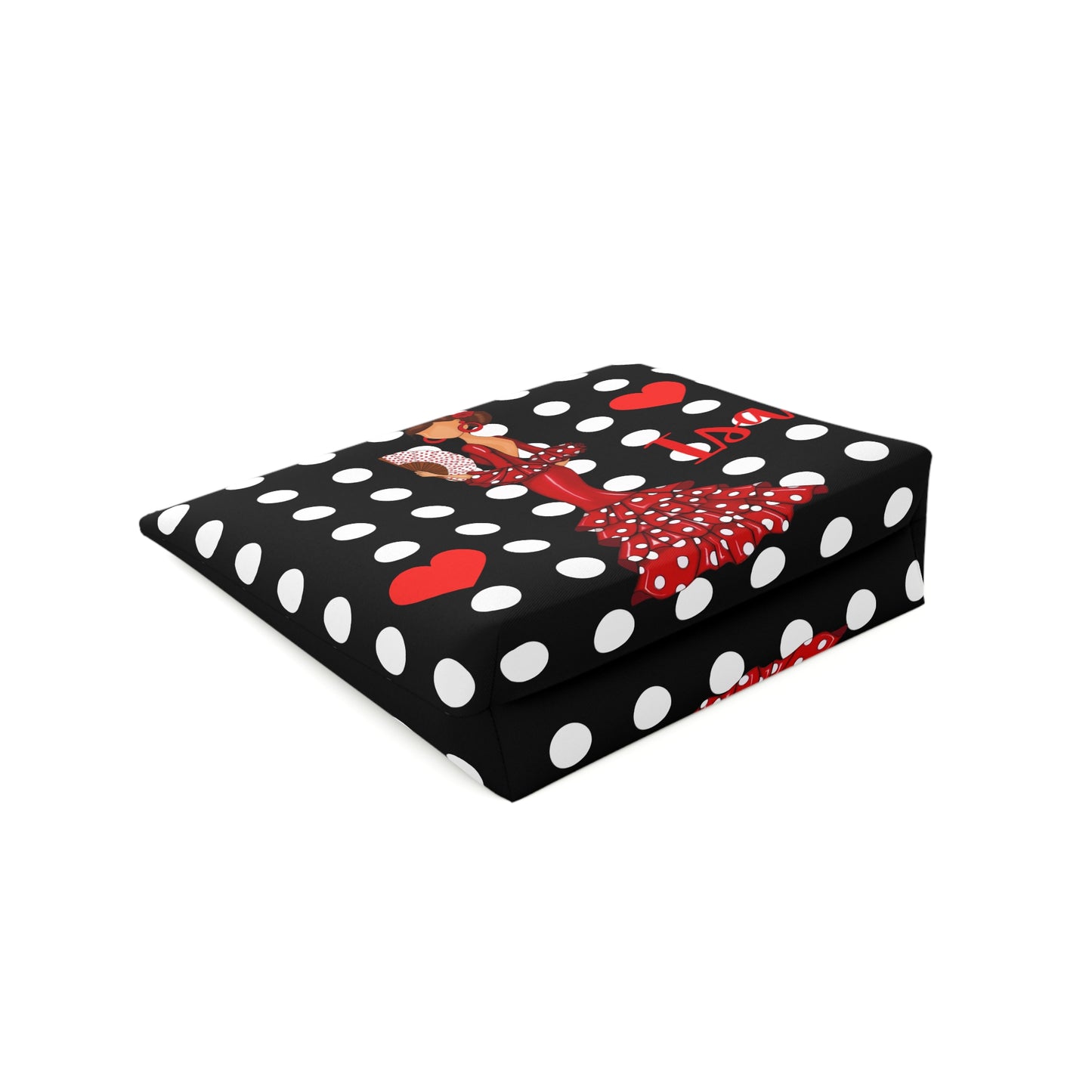 a black and white polka dot box with a red bow