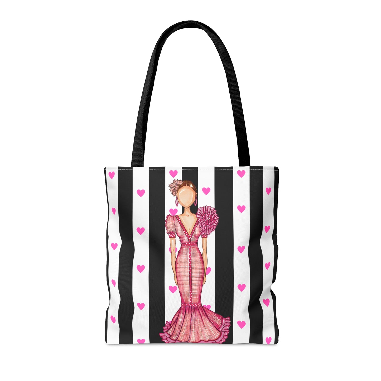 a black and white striped bag with a woman in a pink dress