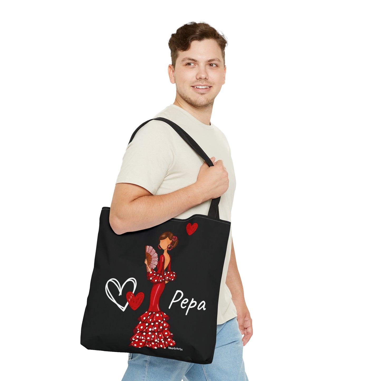 a man carrying a black tote bag with a picture of a woman in a