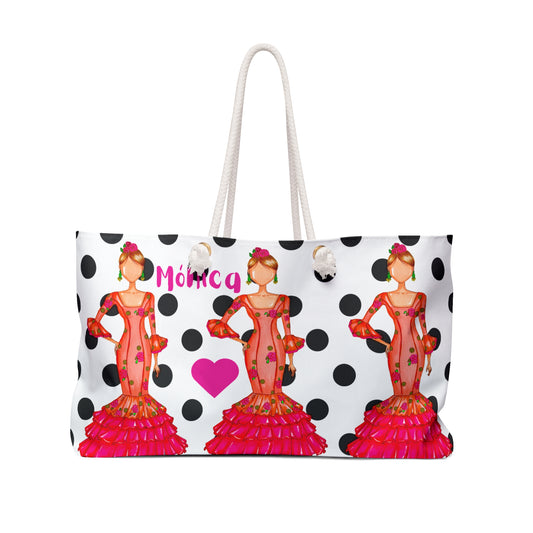 a polka dot bag with a woman's image on it