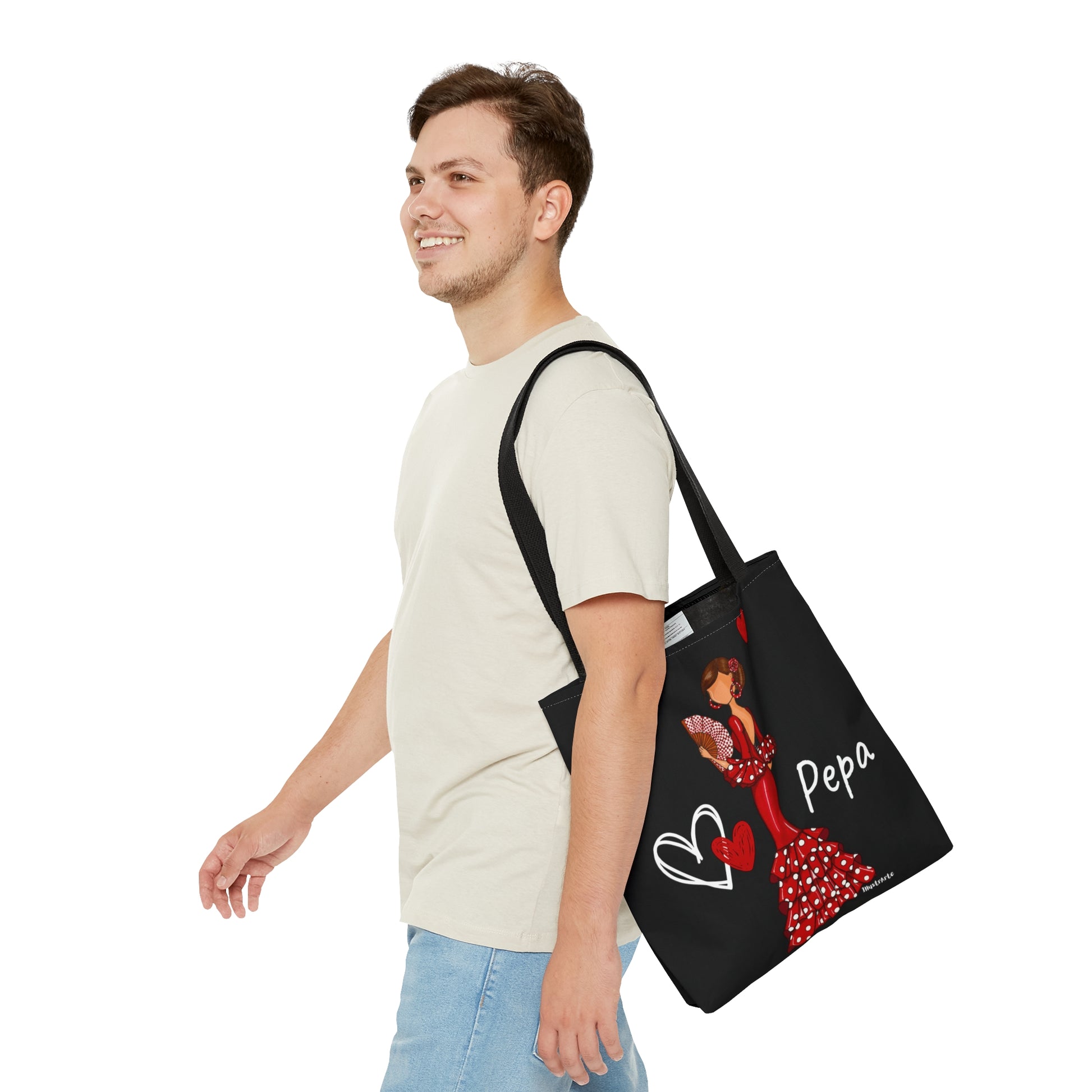 a man carrying a tote bag with a picture of a woman on it