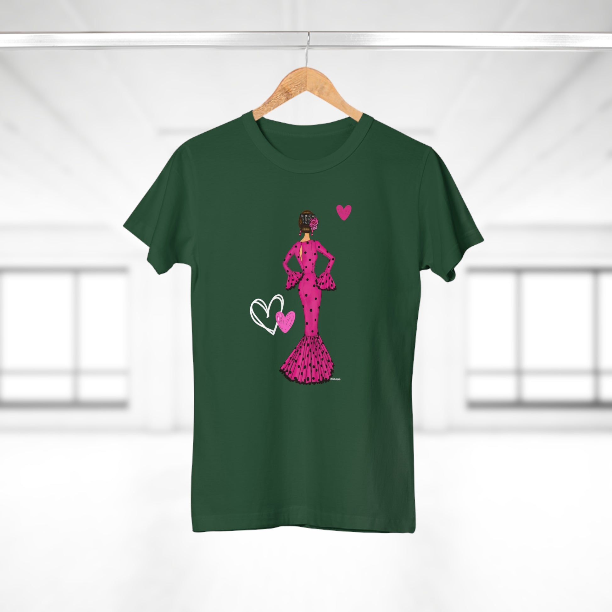 a green t - shirt with a woman in a pink dress holding a heart