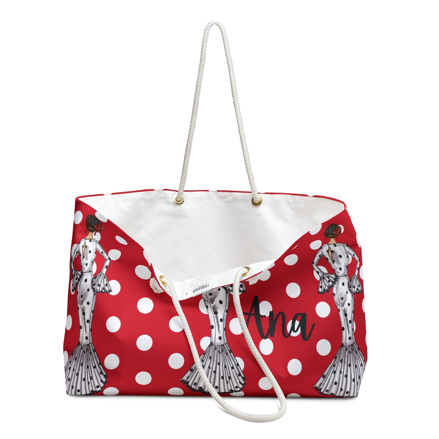 a red and white polka dot purse with a white handle
