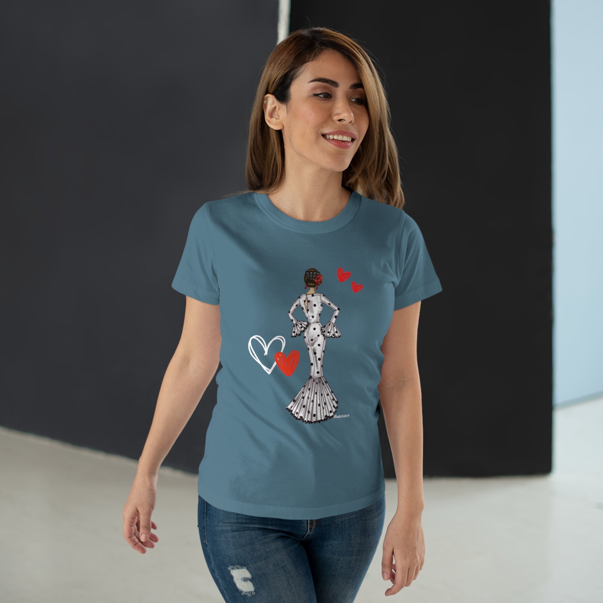 a woman wearing a t - shirt with a heart on it
