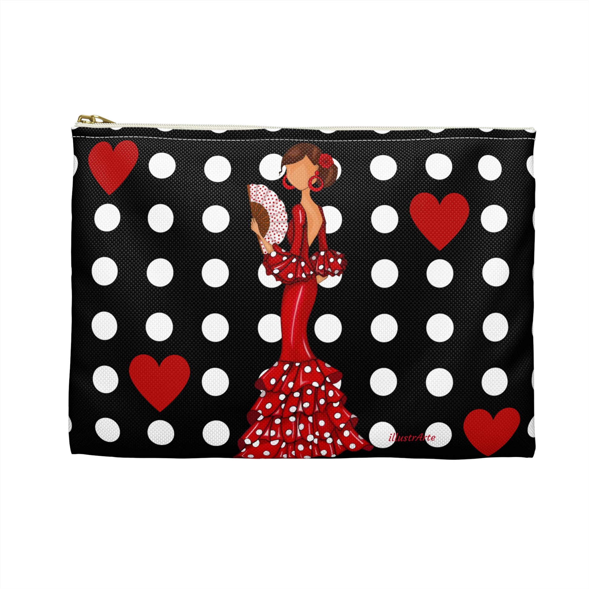 a black and white polka dot purse with a woman in a red dress holding a