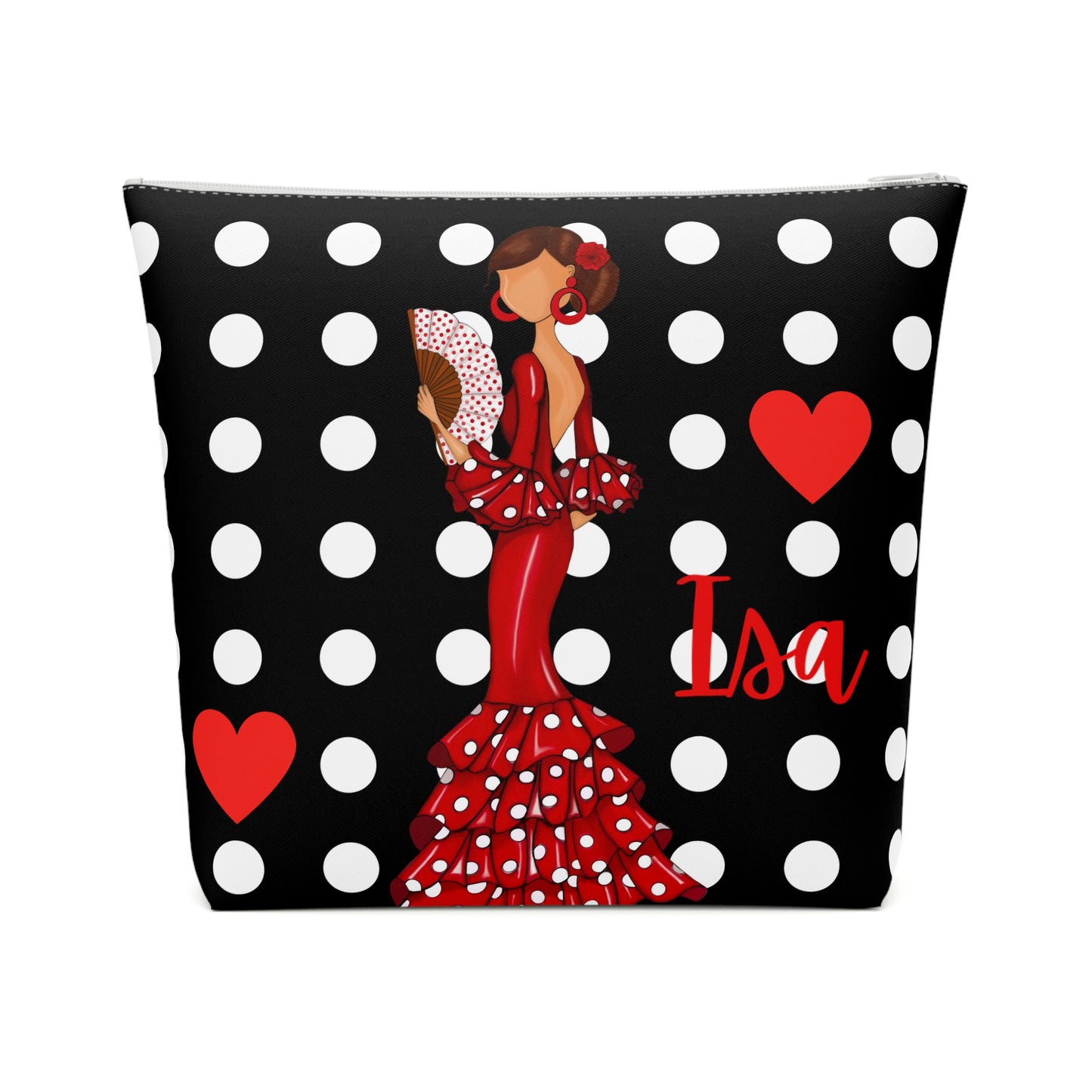 a black and white polka dot bag with a woman in a red dress