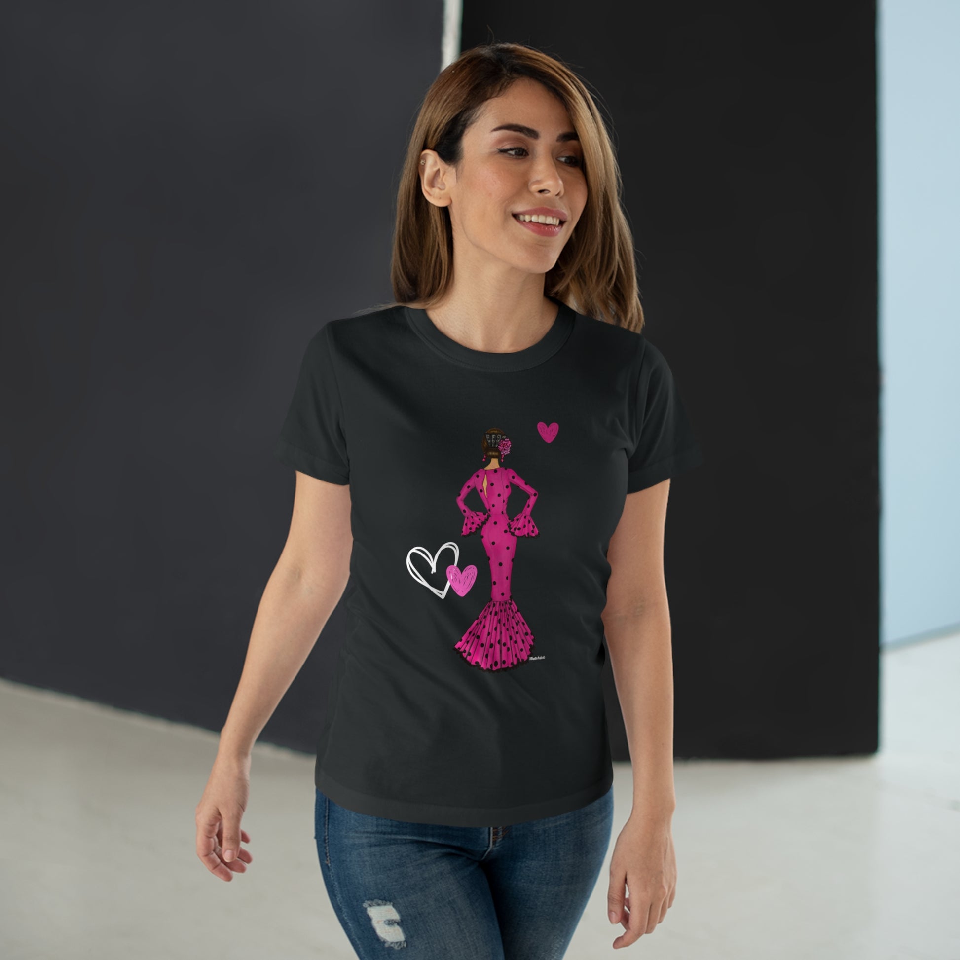 a woman wearing a t - shirt with a princess silhouette on it