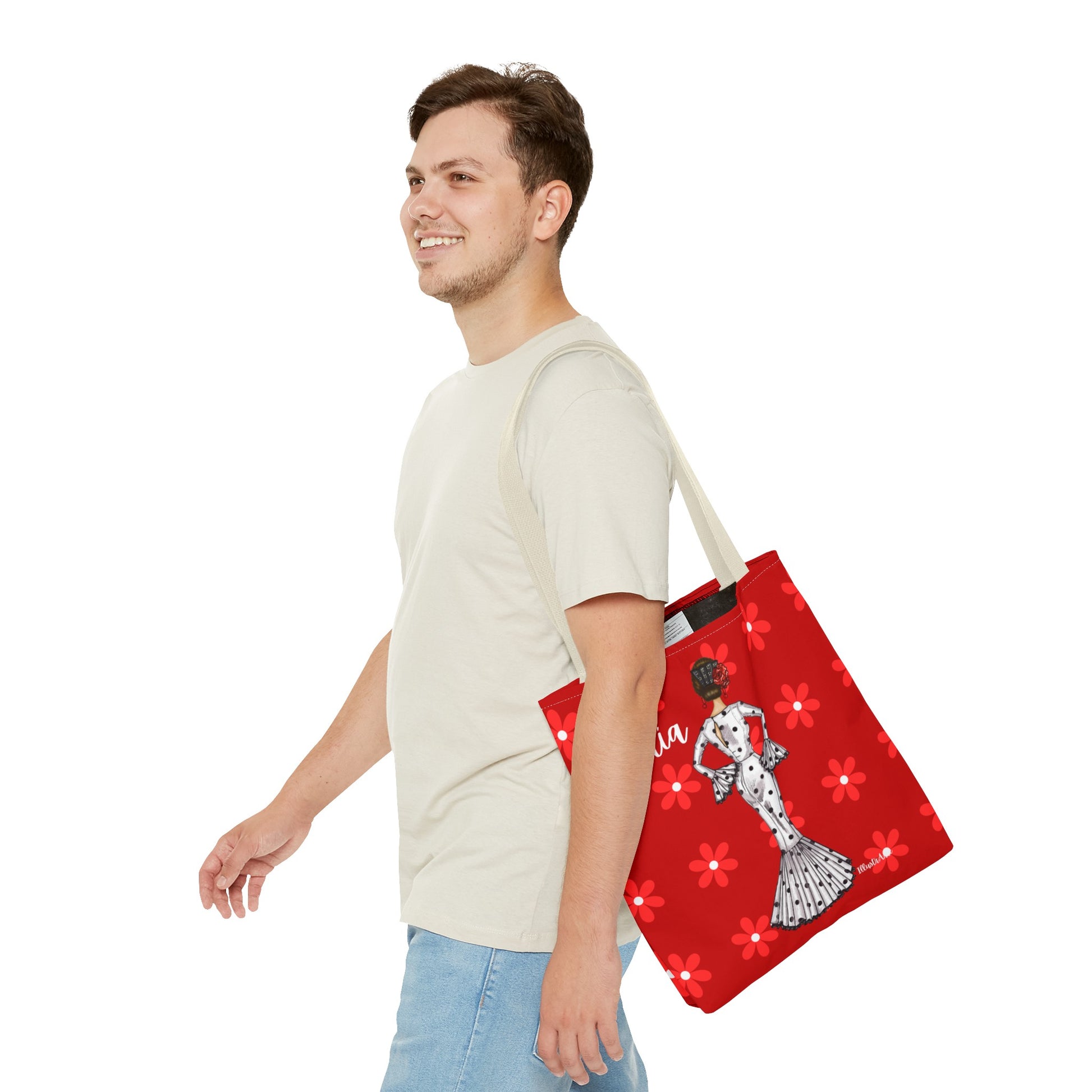 a man carrying a red bag with a lady on it