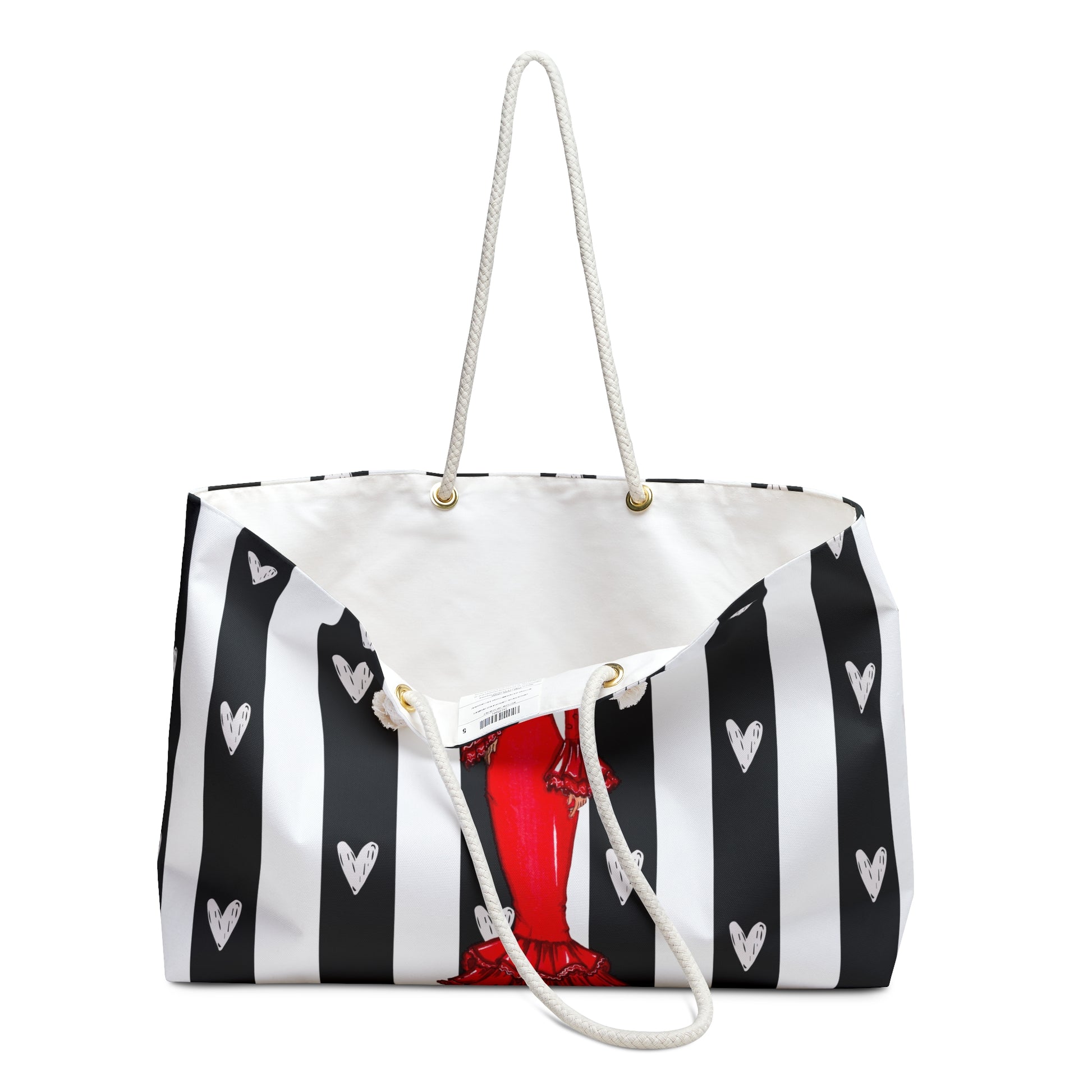 a black and white striped bag with hearts on it