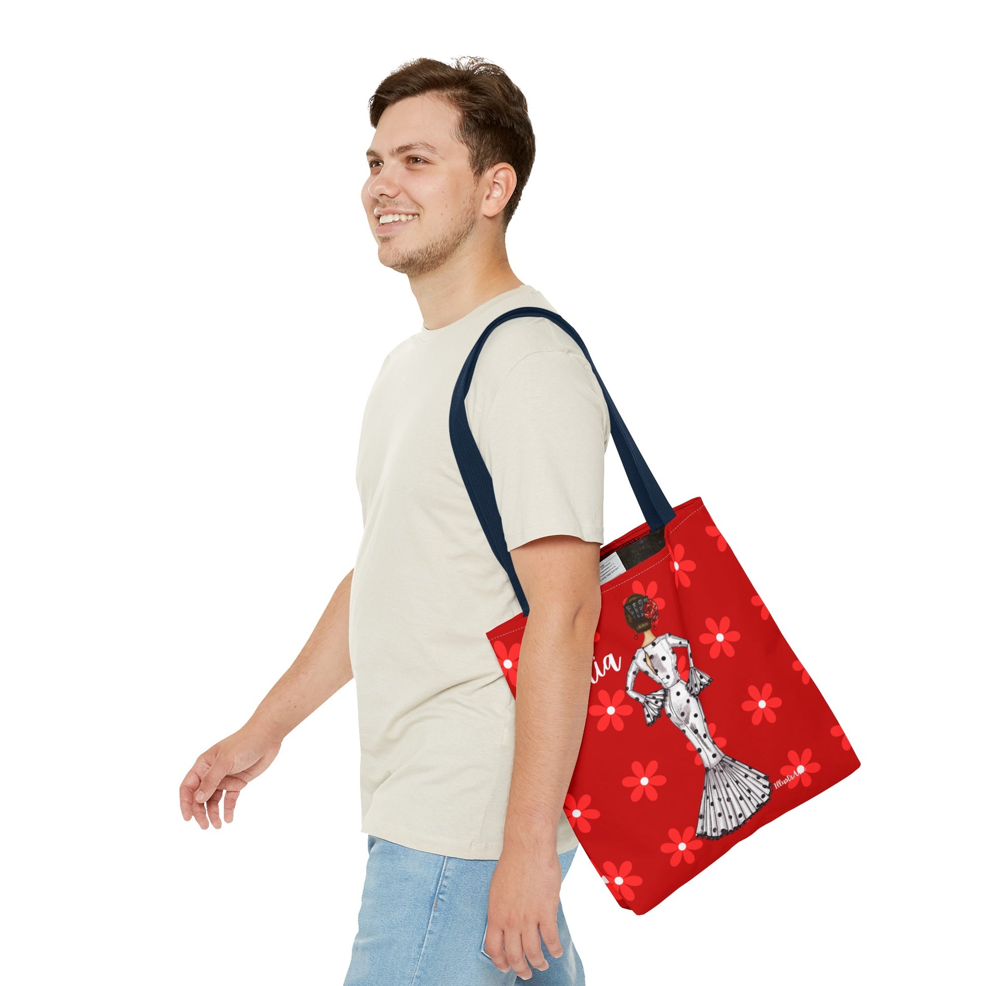 a man carrying a red bag with a lady on it