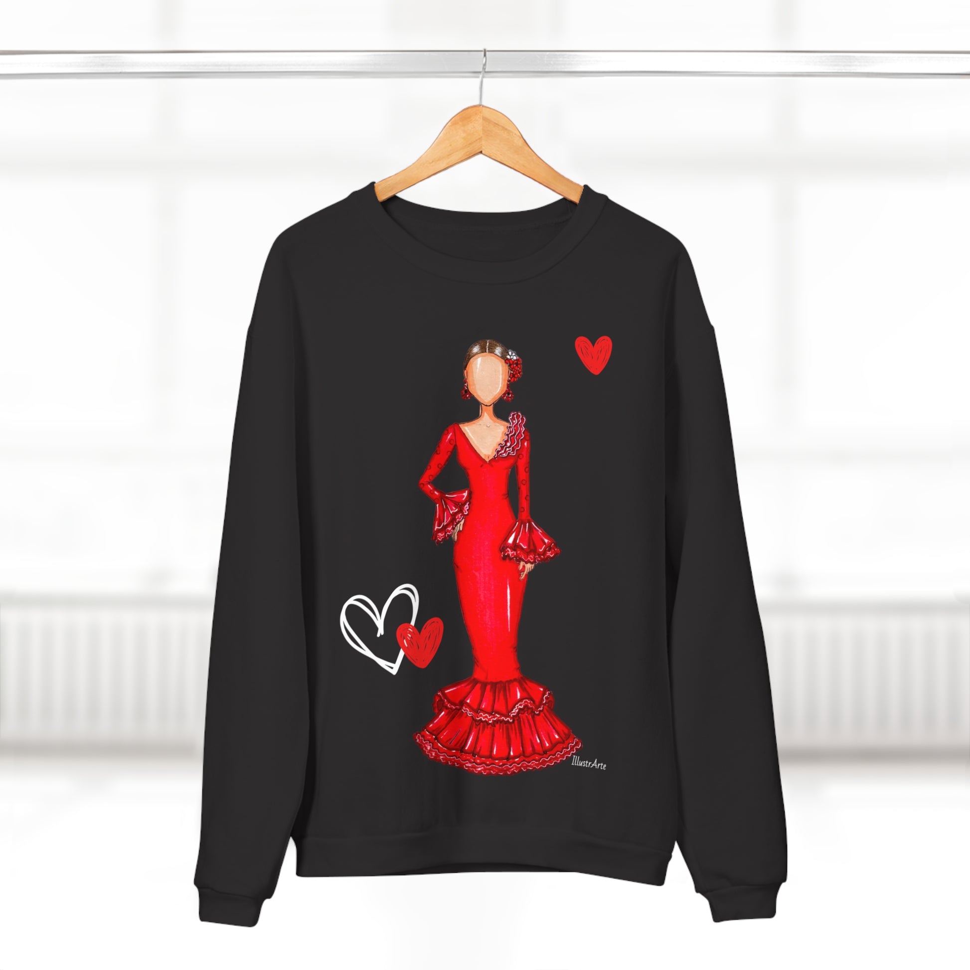 a black sweater with a picture of a woman in a red dress