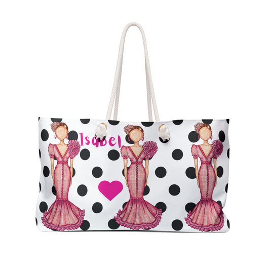 a polka dot bag with a woman's image on it